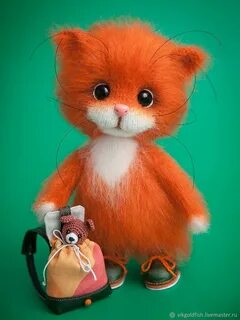 Рыжая игрушка
