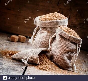 Brown sugar, packed in bags, selective focus Stock Photo. 