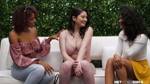 Busty Alyx returns at NetVideoGirls with two exotic friends.