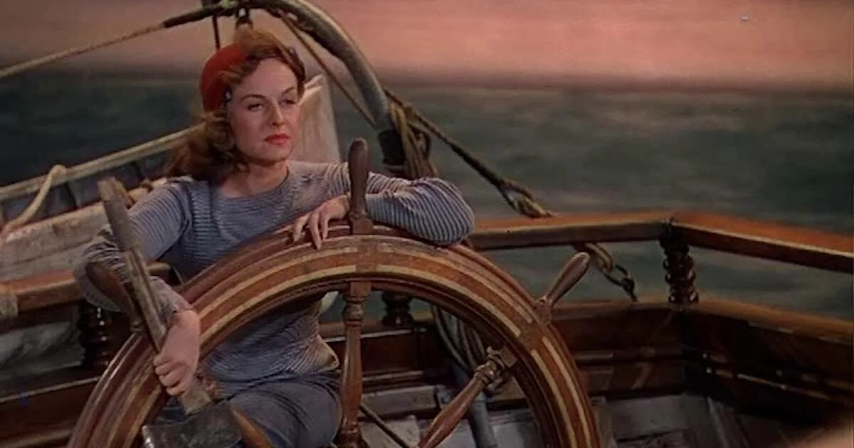 Грей стоял у штурвала. За штурвалом корабля. Капитан за штурвалом корабля. Пиратский корабль. Капитан у штурвала.