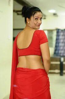 Telugu Actress Apoorva Aunty Hot in Red Saree Exposing Navel with huge boob...