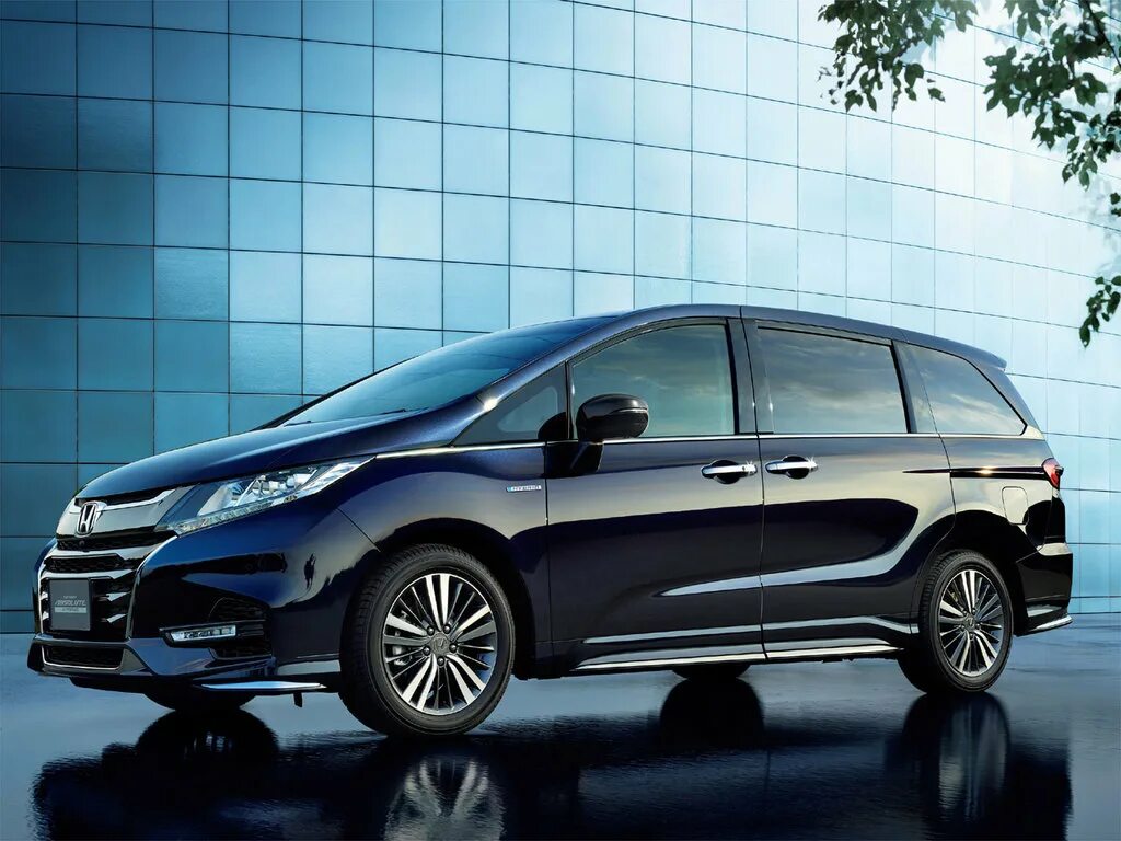 Минивэн клиренс. Honda odyssey 2017. хонда одиссей 2017. honda odyssey 2017 hybrid. минивэн хонда одиссей 2017.