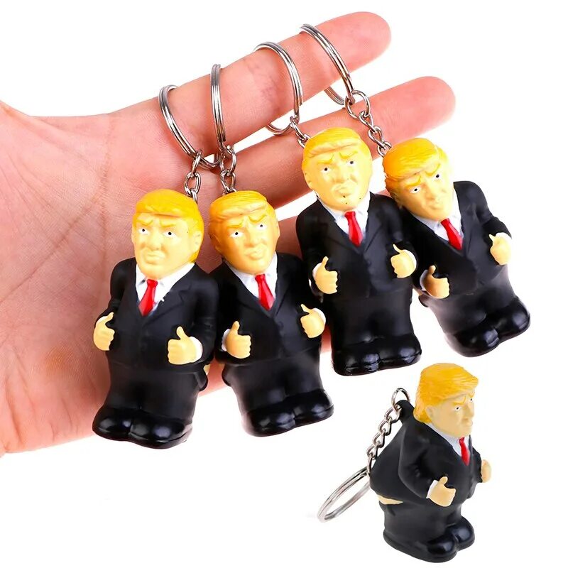 Брелок с трампом. Брелок с надписью. Трамп игрушка. Подвески трампа. Машина трампа игрушка.