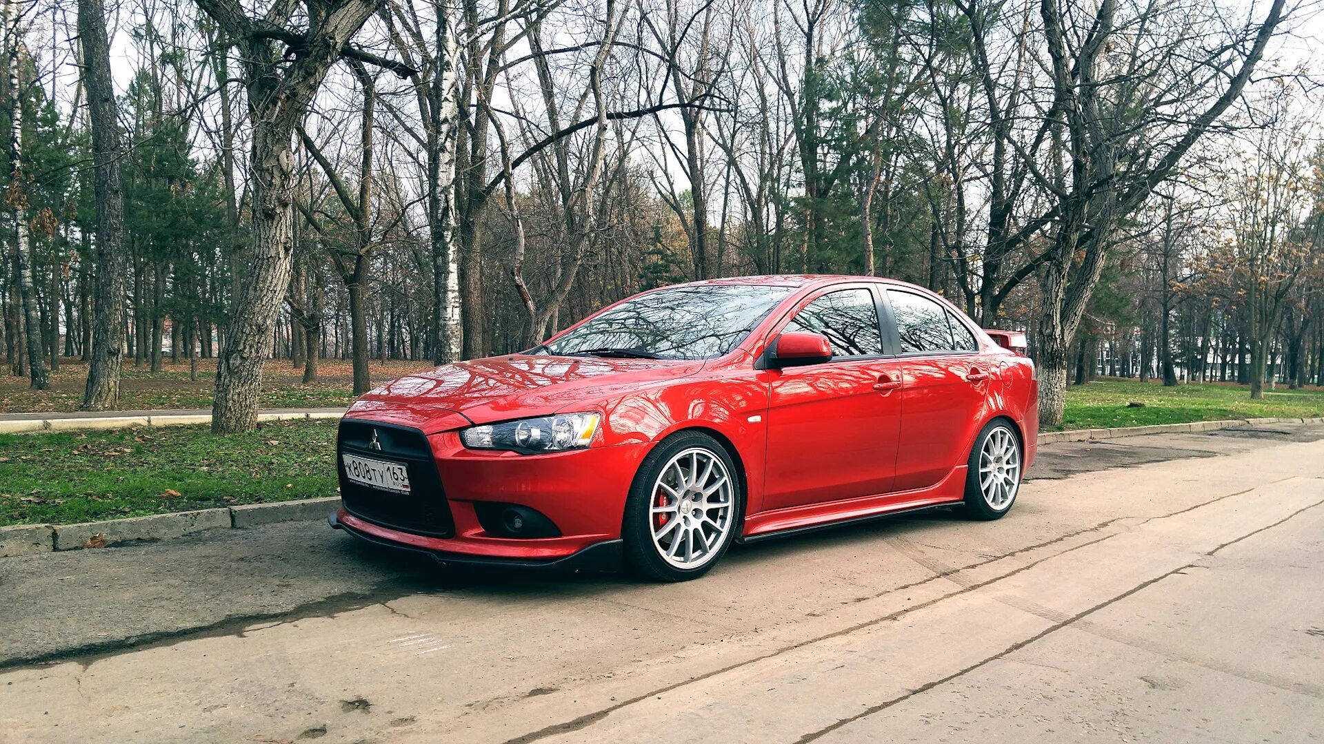 Митсубиси Лансер 10 красный. Лансер 10 занижение -30. Lancer 10 занижение. Mitsubishi Lancer 10 занижение.