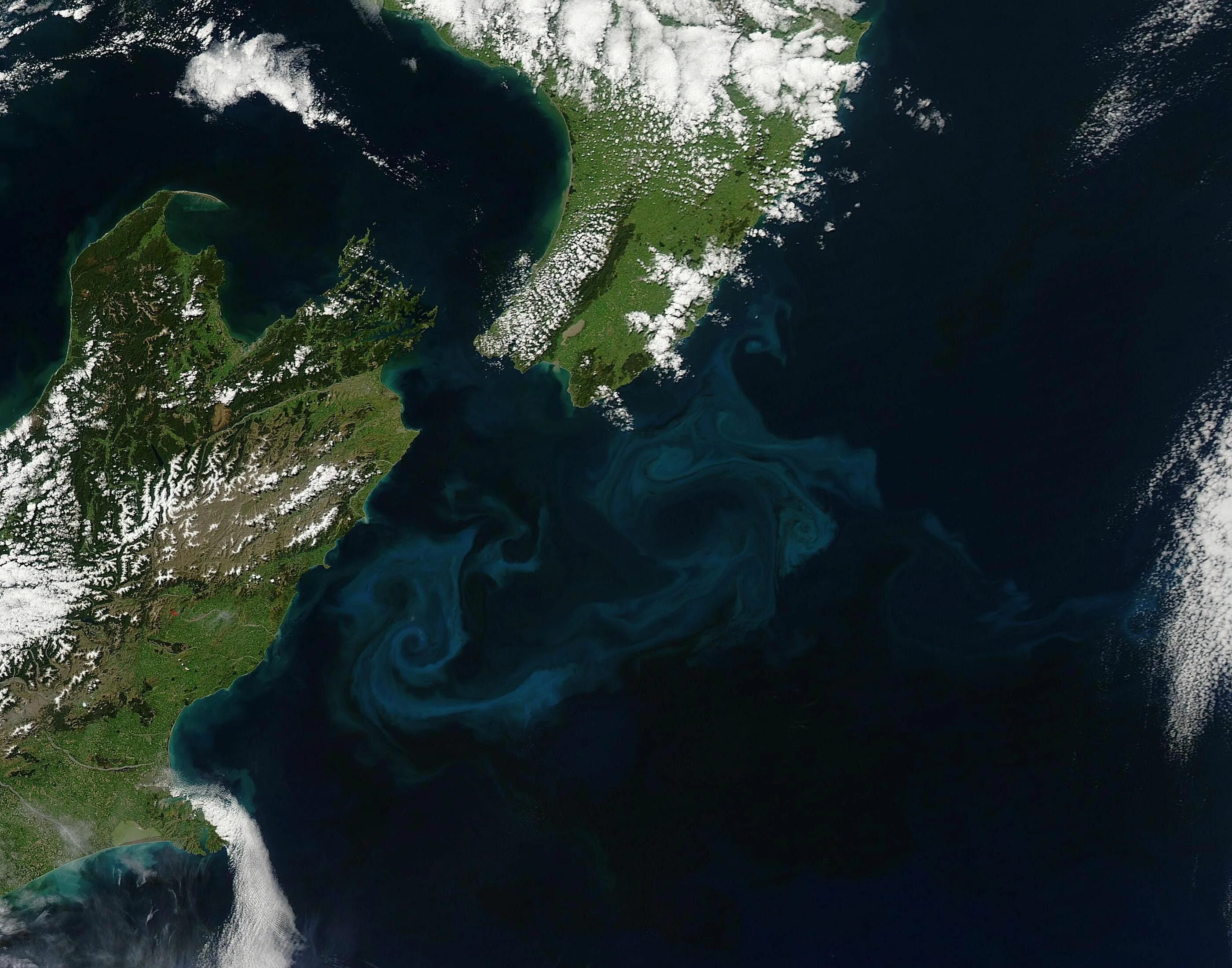 Новая зеландия тихий океан. Новая Зеландия снимок из космоса. Новая Зеландия со спутника. Остров новая Зеландия космический снимок. Космический снимок земли.
