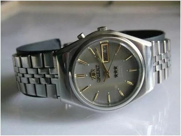 Часы ориент как отличить оригинал. Orient 1990. Orient 3 звезды. Часы "Ориент" японские механические ролекс. Часы Ориент 1994 год.