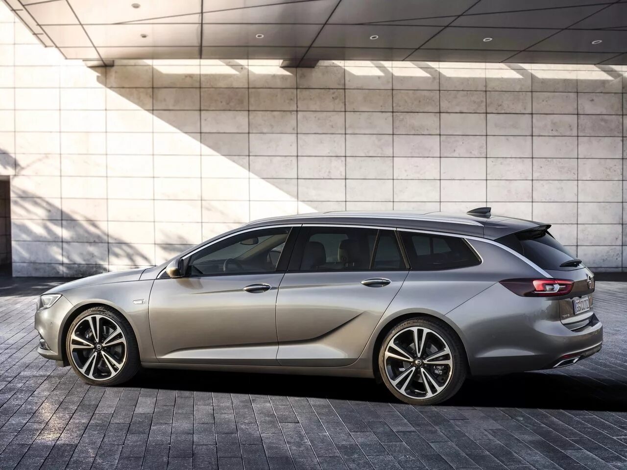 Opel ii. Опель Инсигния универсал 2017. Opel Insignia Sports Tourer 2017. Opel Insignia Sports Tourer 2018. Opel Insignia Sports Tourer 2022.