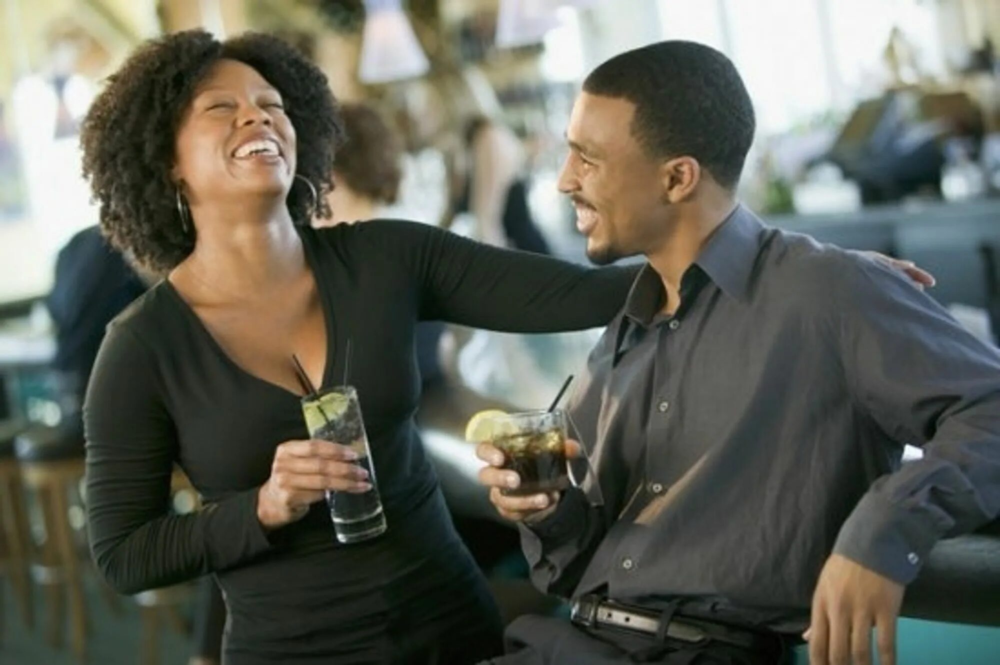 Break a date. Single people. break into laughter. courtship man. black security man and woman.