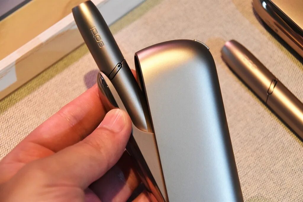 Iqos работа. Айкос а1503. iqos 3 duo. айкос 3 дуос бронзовый. silver iqos duo.