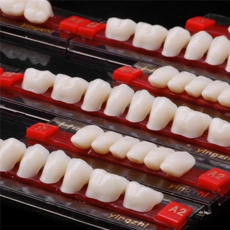 Искусственные зубы. Пластмассовые искусственные зубы. Фарфоровые искусственные зубы.