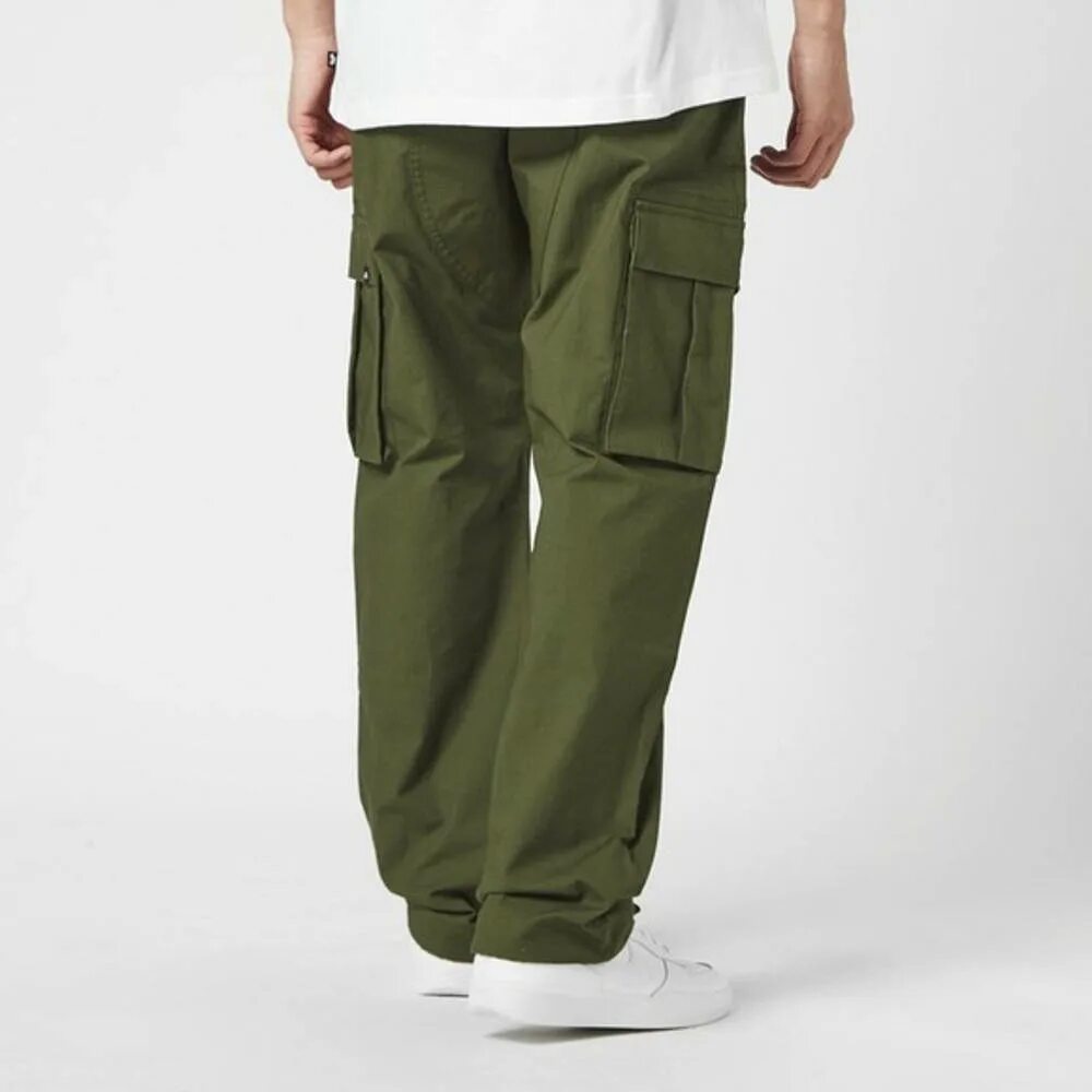 Nike cargo. Nike Cargo Pants. Nike SB Cargo Pants. Nike Green Pants. Штаны карго найк оверсайз.