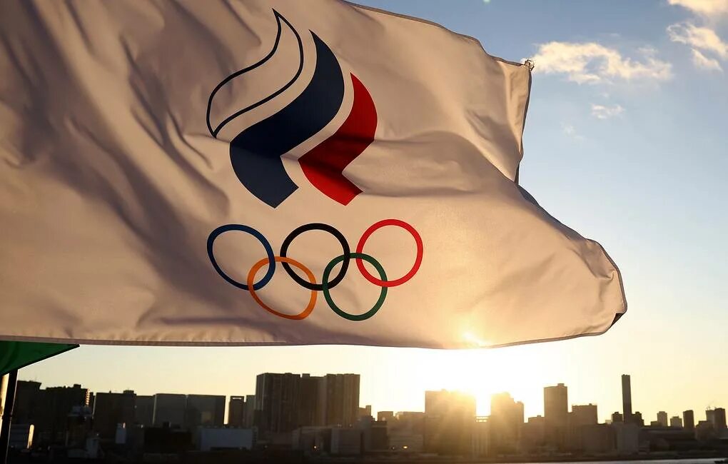 Флаг российского олимпийского. Олимпийский флаг Токио. Олимпиада в Токио 2022. ПЛИТУХИН Родион Олимпийский комитет России. Олимпийский флаг Токио 2020.