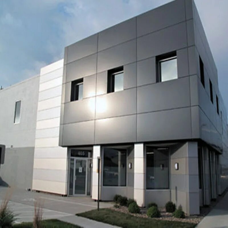 Фасад нежилого здания. Композит сэндвич панелей. exterior aluminium composite panel 4k. алюкобонд графит. купава алюкобонд фасад.