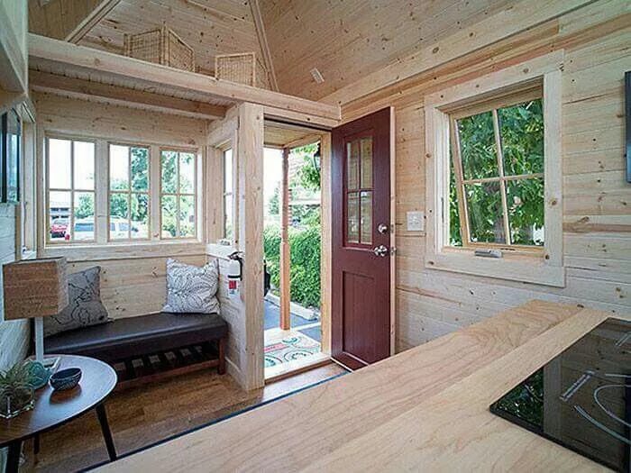 Peek inside this enchanting cabin and try not to fall for the cozy reading nook 