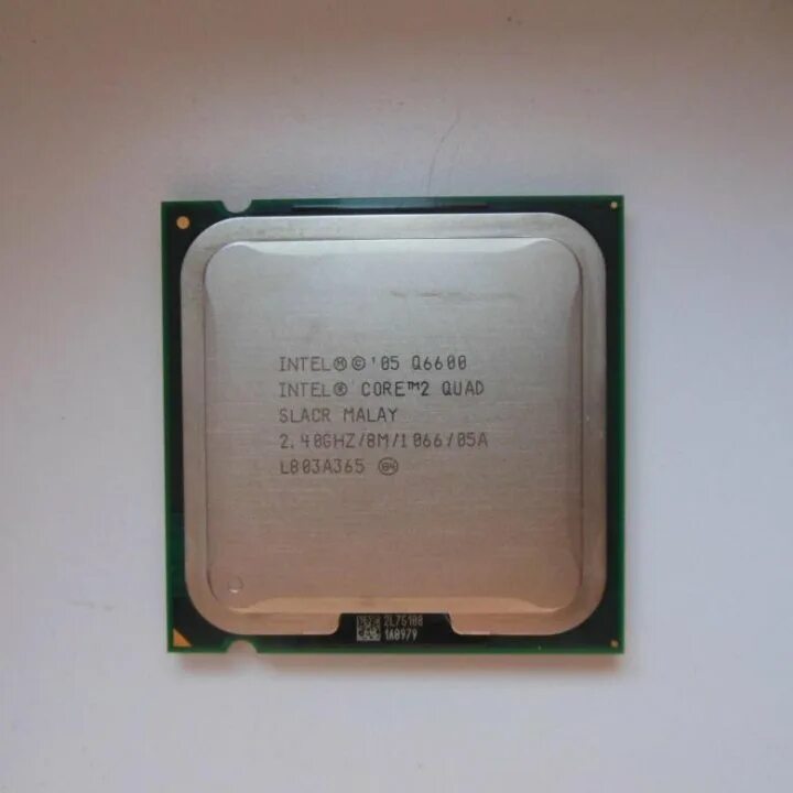 Intel r core tm quad cpu. Процессор intel core 2 quad q6600. intel core 2 quad 6600. core 2 quad q6600 кристаллы. intel core 2 q6600 @ 2.40 ггц.