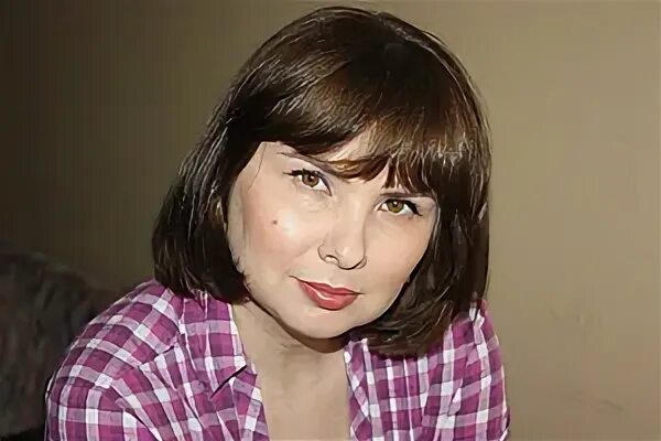 Сулейманова е