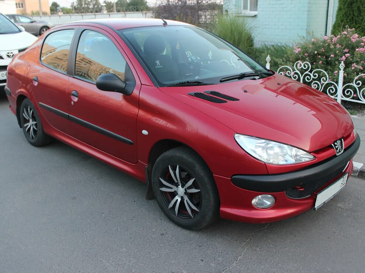 Peugeot 206 1998-2012. 2012 1998. 4. пежо 206 1. пежо 206 седан серебристый.