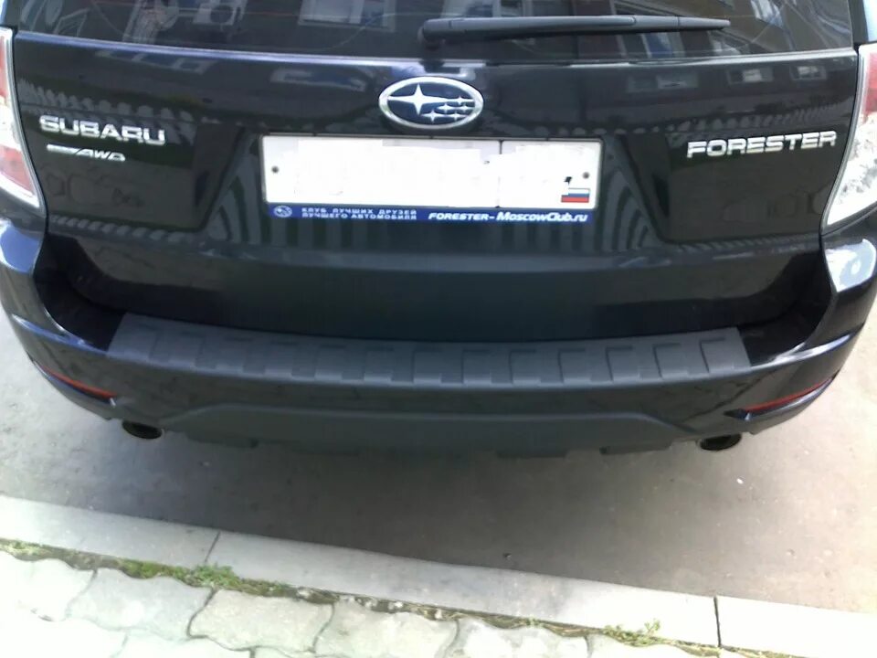 Куплю бампер субару форестер. Накладка защитная заднего бампера Субару Форестер 2012. Накладка заднего бампера Subaru Forester. Subaru Forester 2008 задняя накладка бампера.