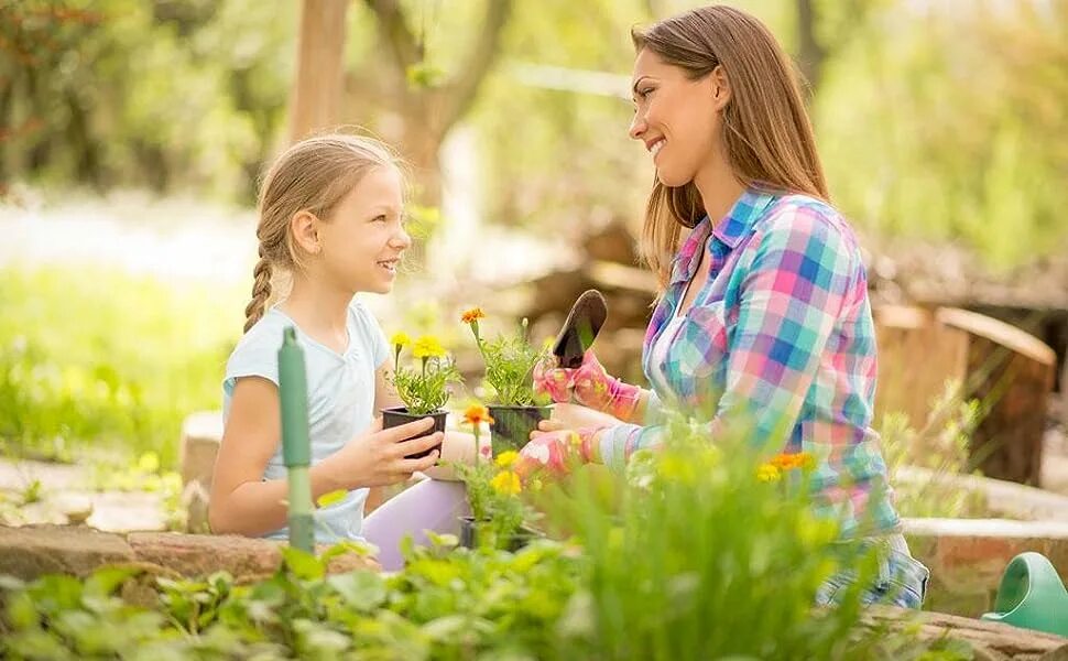 Мама поливает цветы фото. Mother is watering the flowers now. My mother waters the flowers. Mother is watering the flowers now. Садоводство для детей.
