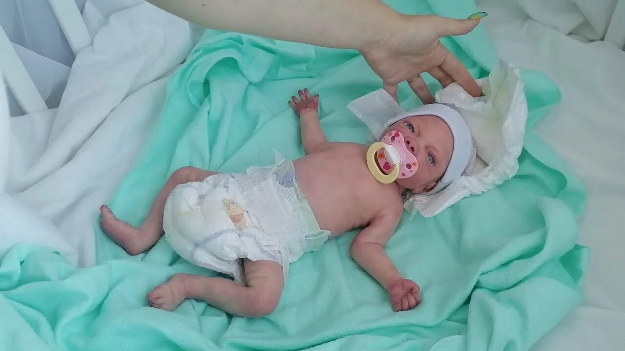 Распаковать реборна