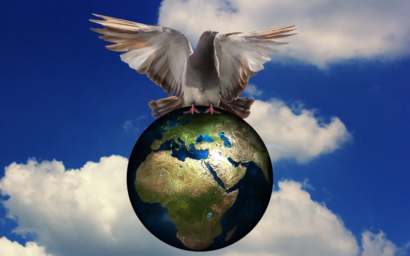 "И на земли мир…". Мир на планете. Голубь мира и земной шар. Символ мира на земле.