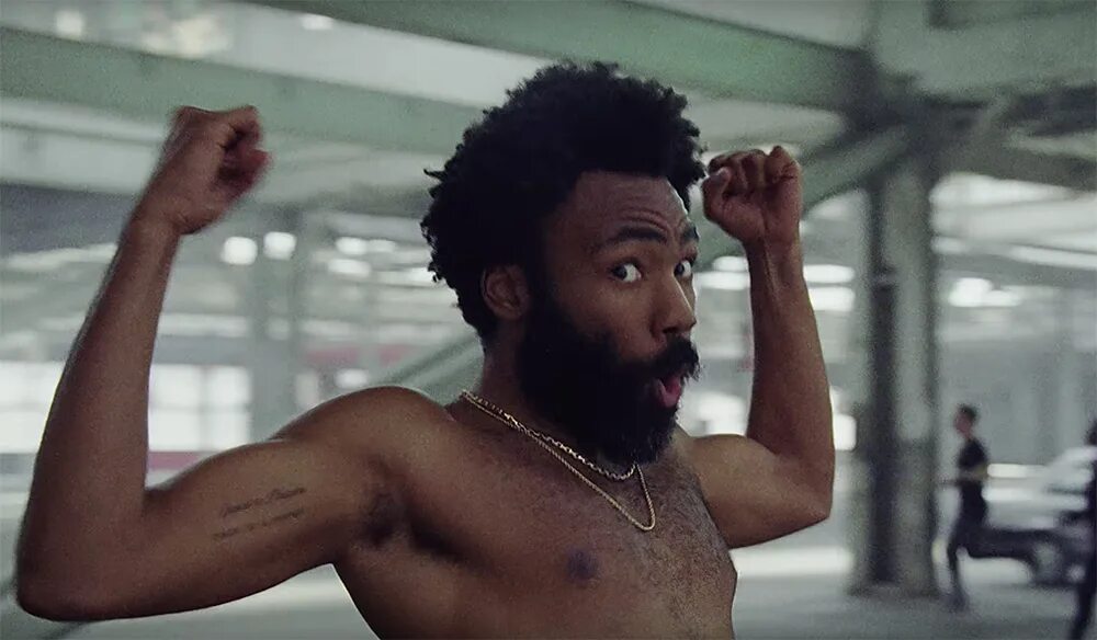This is david. Чайлдиш гамбино репер. джон дэвид вашингтон this is america. michino timothy kimino kimochi.
