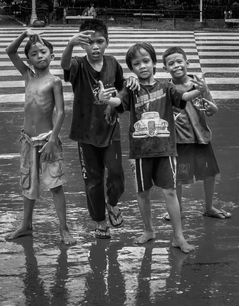 Barefoot boy friend. Rain boys