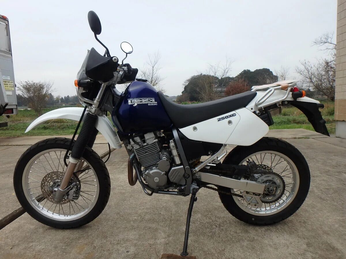 Джебель 250 купить. Suzuki Djebel 250 2004. Suzuki Djebel 250xc 2004. Suzuki Djebel 250. Suzuki Djebel 250 обои.