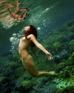 Nude swimming photos.