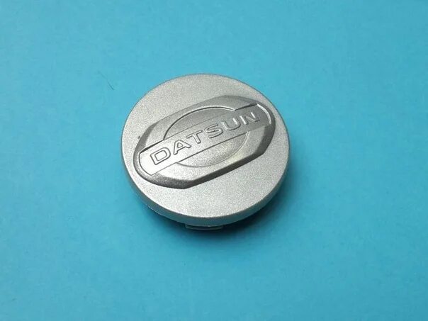 Колпаки датсун 14. 403155pa0b колпачок ступицы datsun. Заглушки на датсун. Колпак ступицы для дисков pdw. Заглушки на датсун.
