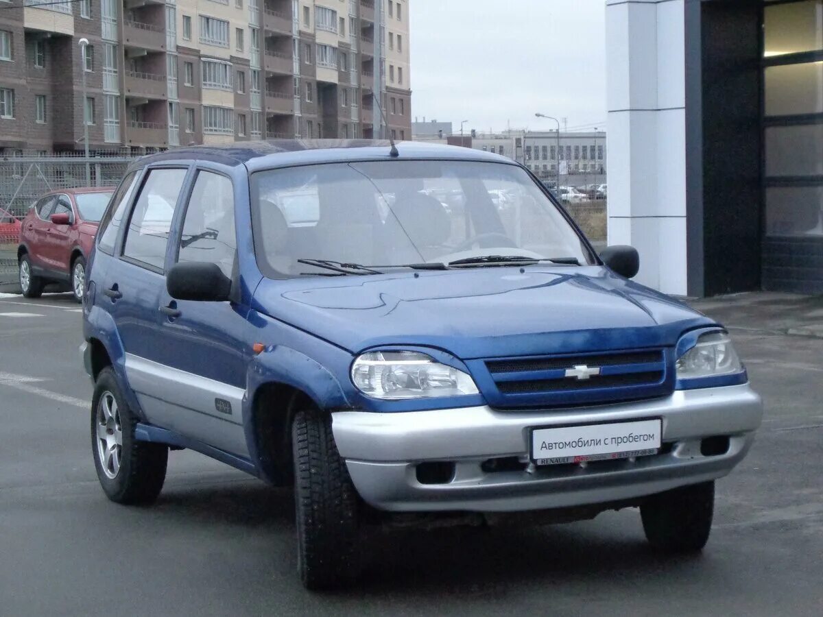 Шевроле нива 2006 год серебристый. Нива шевроле 2006г. Chevrolet niva niva 2006. Нива шевроле синяя 2006. Синяя нива шевроле 2006г.