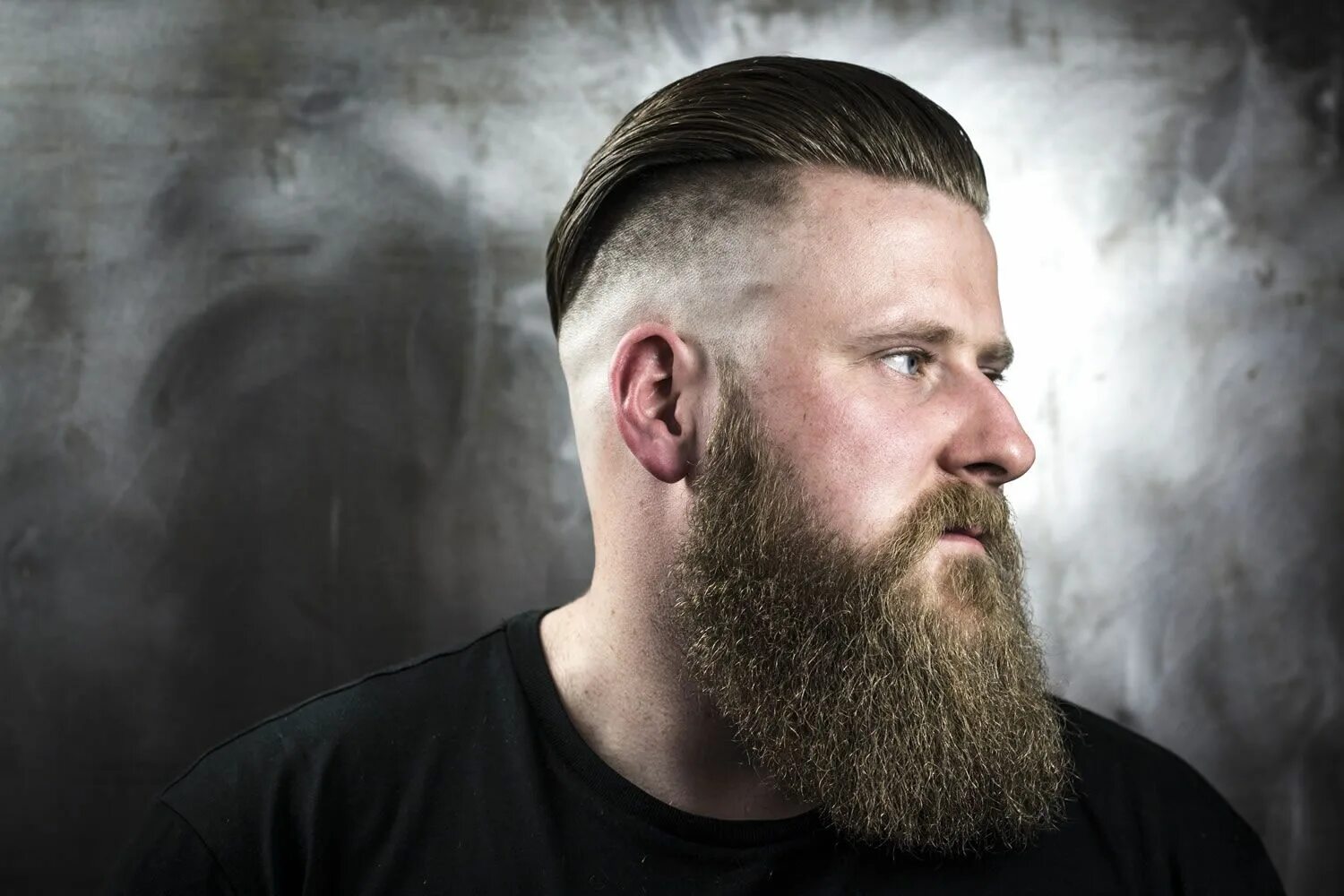 He has a beard. Большая борода. высокая борода. борода на щеках. peak beard.