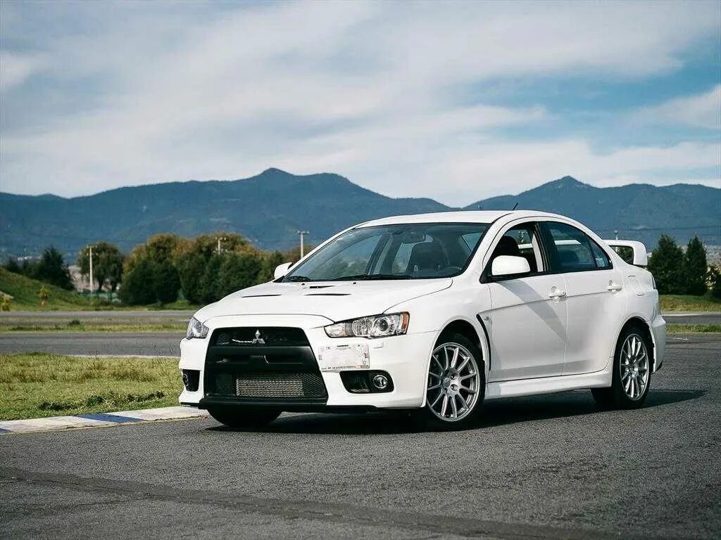 Mitsubishi evo x. Митсубиши Лансер 10 Эво. Митсубиши Лансер эко 10. Митсубиси Лансер эволюшион10. Mitsubishi Evolution EVO 10.