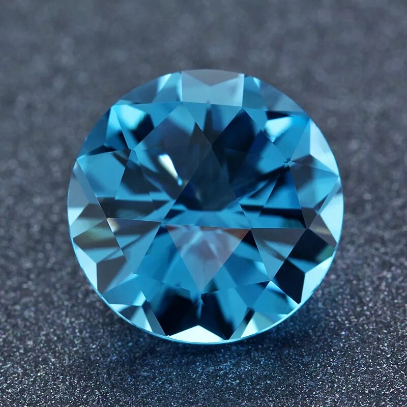 голубой топаз минерал. голубой топаз цвет. топаз лондон блю. топаз лондон блю камень натуральный. голубой топаз камень.