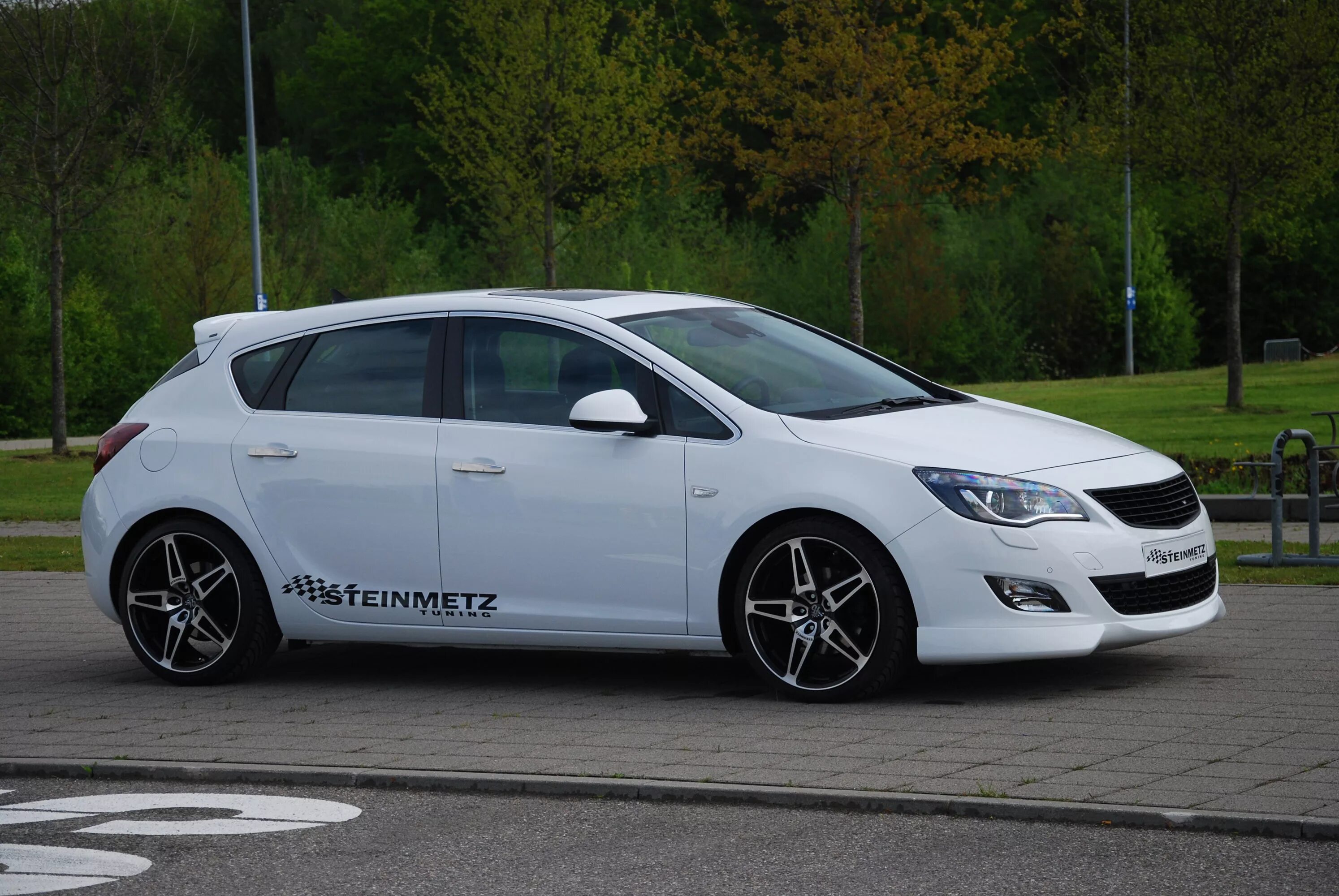 Тюнинг опель j. Opel Astra j 2010 Tuning. Opel Astra j Tuning хэтчбек. Opel Astra j хэтчбек тюнинг. Opel Astra j тюнингованная.