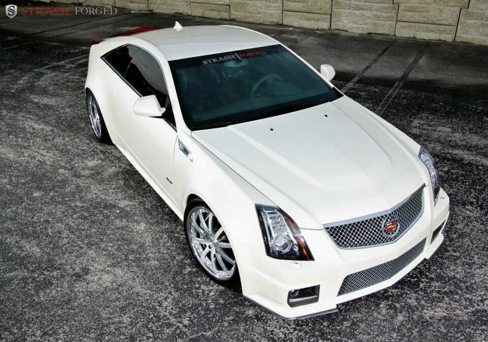 Золотистый Cadillac CTS: коллекция фотографий Авто-мото orion-tennis.ru