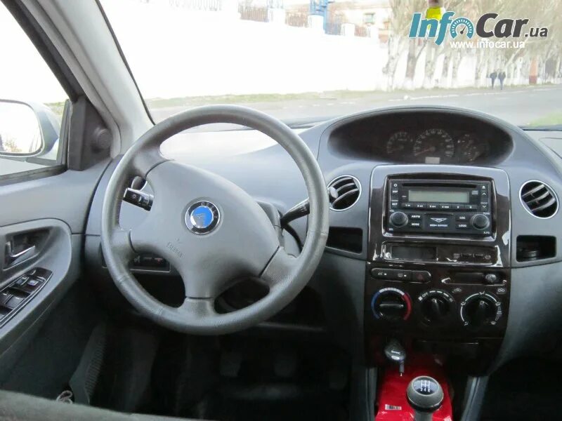 Geely mk сигнализация. Geely mk 2011. geely mk 2011 интерьер. geely mk 15 салон. джили мк 2011 салон.