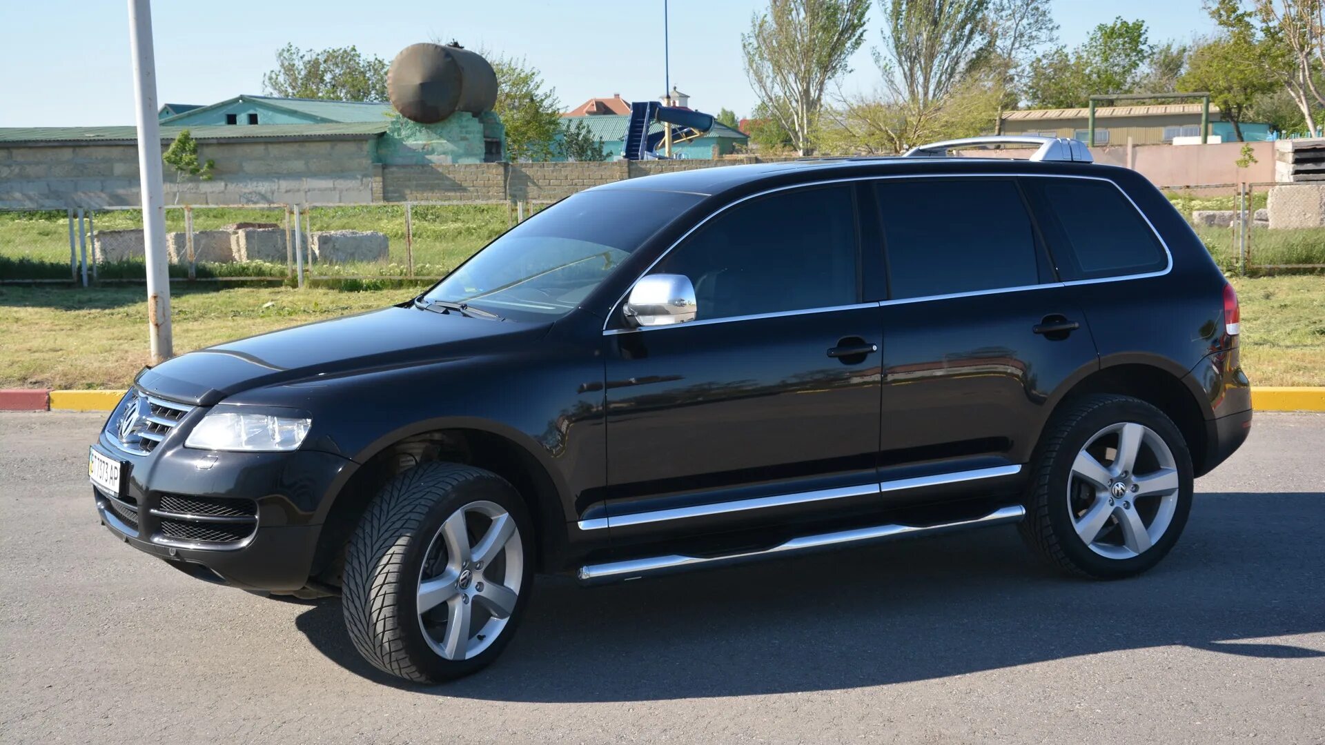 Купить фольксваген туарег 1. Volkswagen Touareg 2008 Black. Фольксваген Туарег 2004 черный. Фольксваген Туарег 2008 черный. Фольксваген Туарег 2004 года 4.2.