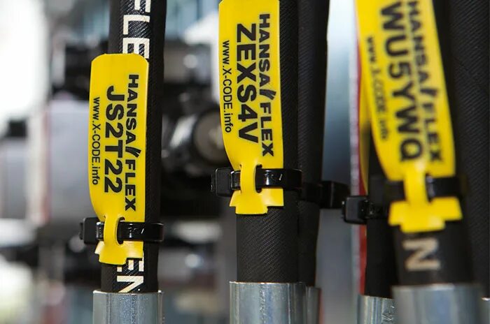 Hansa flex. Шланг ханза флекс. рукав высокого давления рнвд hansaflex. бирки на рукава высокого давления. бирки для гидравлических шлангов.