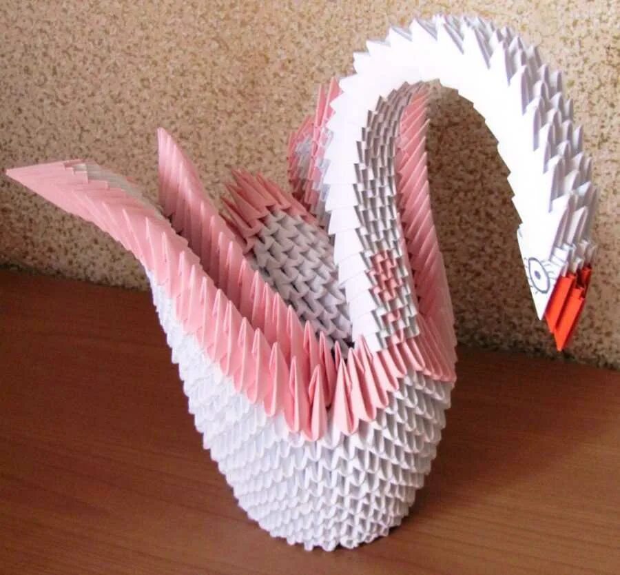 Лебедь шипун оригами. Модульное оригами лебедь. Модульное оригами из бумаги лебедь белый большой. Лебедь из треугольных модулей.