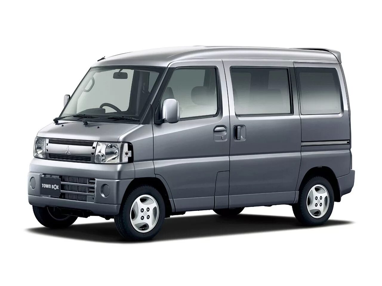 Микроавтобус это легковой автомобиль. Mitsubishi Town Box 1999. Mitsubishi Миникаб. Mitsubishi Minicab микровэны. Митсубиси Миникаб 2011.