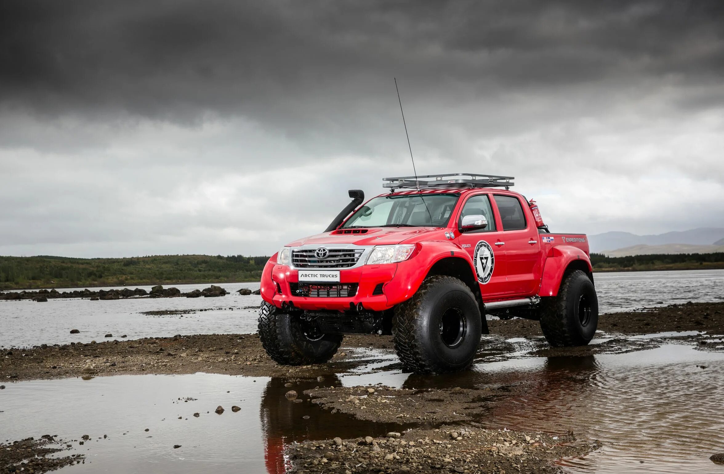 Полный привод хайлюкс. Hilux Arctic Trucks. Toyota Hilux Arctic Trucks. Hilux at38. Toyota Arctic Truck 6x6.