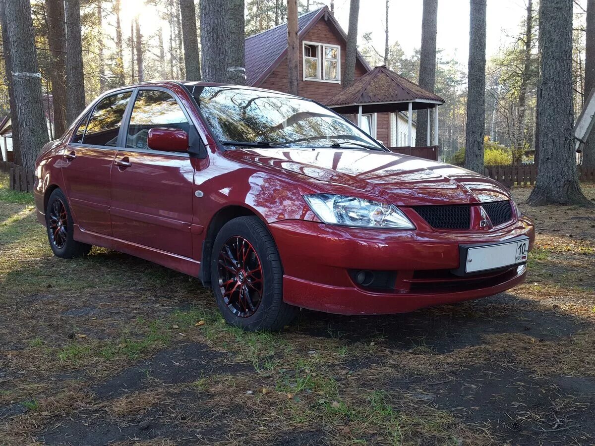 Лансер 9 купить новую. Мицубиси Лансер 9 красный. Митсубиси Лансер 2006. Mitsubishi Lancer LX 2006. Mitsubishi Lancer 9 2006.