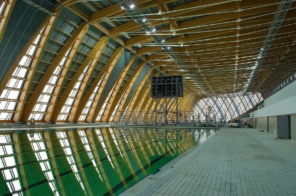 Дворец водных видов спорта казань цены. Дворец водных видов спорта Казань трехшарнирная арка. Стадионы для водных видов спорта. Водный дворец. Водный стадион.