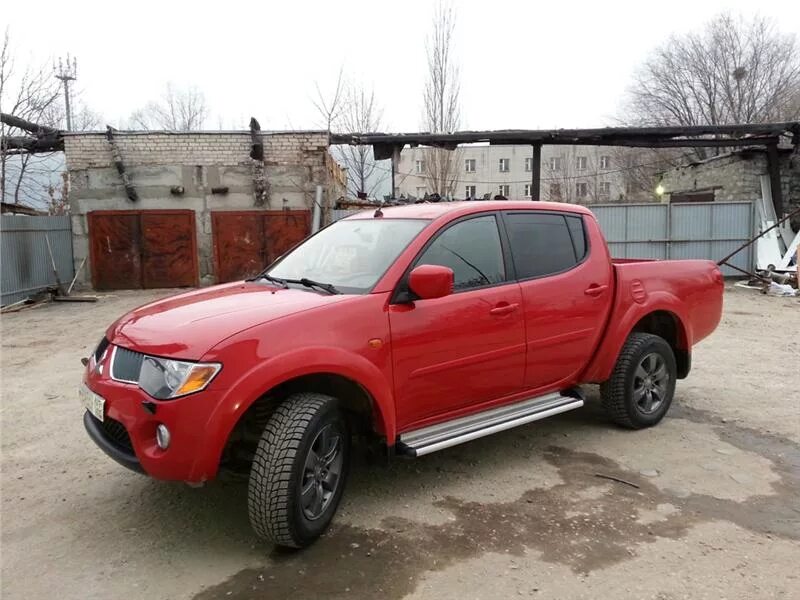 Митсубиси л200 2007 года. Мицубиси л200 красный. Mitsubishi l200 красный. Митсубиси л200 2012.