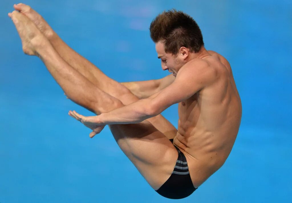 Прыгун в воду сша. Прыжки с трамплинв в оду. Прыгун в воду сша. Виктор минибаев 2020. Илья арзютов прыжки в воду.