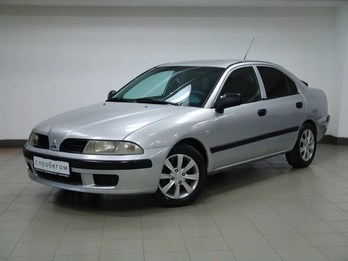 Carisma Mitsubishi 2003 лифтбек. Mitsubishi Carisma 2003 Liftback. Митсубиси Каризма 2003 Рестайлинг. Mitsubishi Carisma 2003 tyninbg. Купить на каризму 1.6