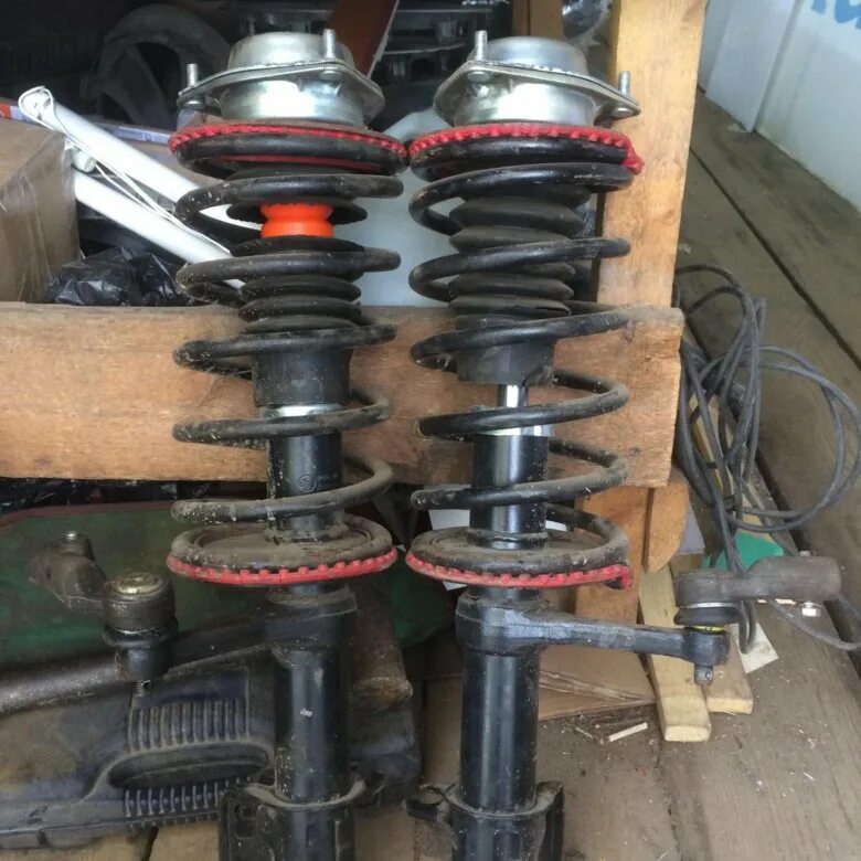 Передняя стойка 10. Киа сид 2011 стойки передние. Задняя стойка лансер 9 схема. Стойка амортизатора лансер 10 передний. Передняя стойка лансер 9 схема.