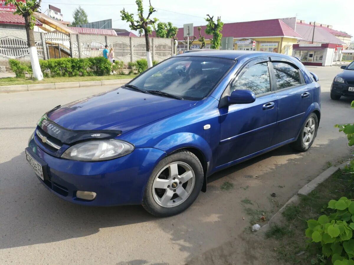 Chevrolet Lacetti 2004. Шевроле Лачетти 2009. Шевроле Лачетти хэтчбек 1.4 синяя. Chevrolet Lacetti 2007 хэтчбек.