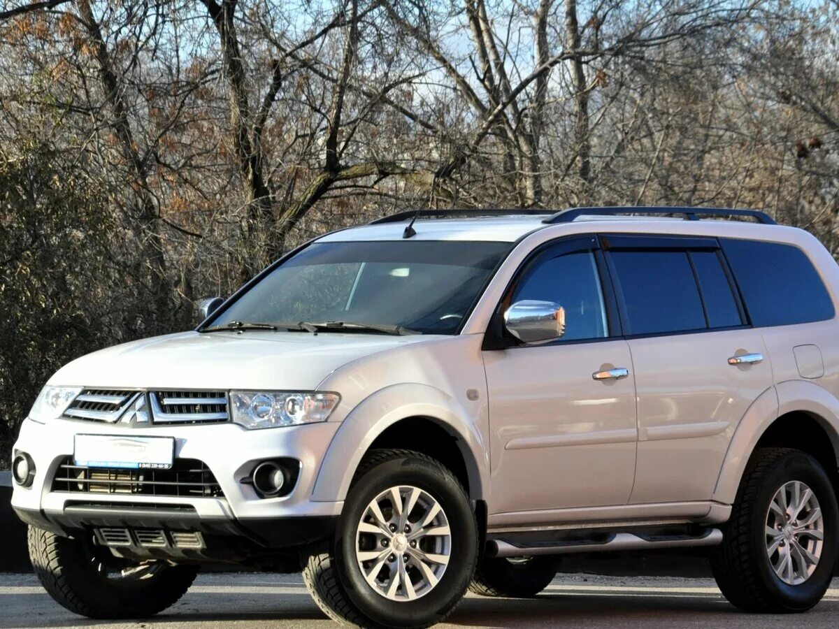 Паджеро спорт дилер. Pajero Sport 2014. Mitsubishi Pajero Sport 2014. Паджеро спорт 2 Рестайлинг. Митсубиши Паджеро спорт 2014.